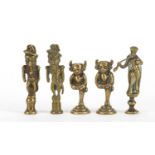 Five antique pipe tampers comprising two devil and three figural design examples, the largest 7cm
