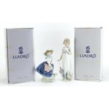 Two Lladro figurines including Summer Stroll both with boxes, numbered 7611 and 5222, the largest
