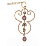 Art Nouveau 9ct gold pink stone and seed pearl pendant on a 9ct gold necklace, the pendant 3.5cm