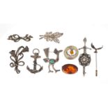 silver brooches including Scottish hardstone anchor, marcasite and amber : For Further Condition