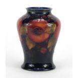 Moorcroft baluster vase hand painted and tube lined in the pomegranate pattern, impressed marks