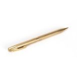 9ct gold Sheaffer propelling pencil with engine turned body, 13cm in length, approximate weight 19.