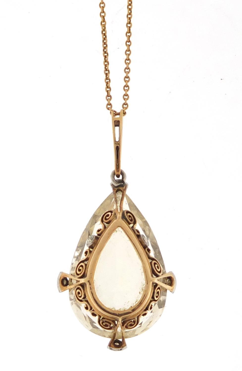 Unmarked gold citrine and diamond tear drop pendant on an unmarked gold necklace, the pendant 4. - Image 2 of 3