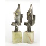 Pair of Art Deco modernist silvered sculptures by Jenter, raised on a square onyx block bases, 39.