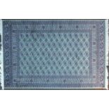 Rectangular Bokhara design green ground floral rug, 230cm x 160cm : For Further Condition Reports