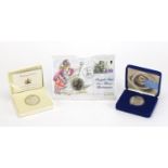 Two silver proof commemorative crowns and a 1998 one ounce silver Britannia coin cover, the crowns