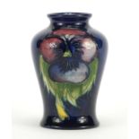 Moorcroft baluster vase, hand painted in the Anemone pattern, painted and impressed factory marks to