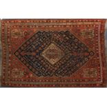 Rectangular Persian Kashgan rug, having and all over stylised design, 214cm x 138cm : For Further