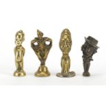 Four antique pipe tampers including a pierrot design example, the largest 7cm high : For Further