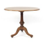 Oval walnut occasional table on turned column and tripod base, 74cm H x 90cm W x 60cm D : For