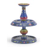 Good Chinese blue ground porcelain candlestick, finely hand painted in the famille rose palette with