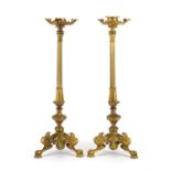 Pair of 19th century ormolu candlesticks with reeded columns, lion masks and claw feet, each 34.