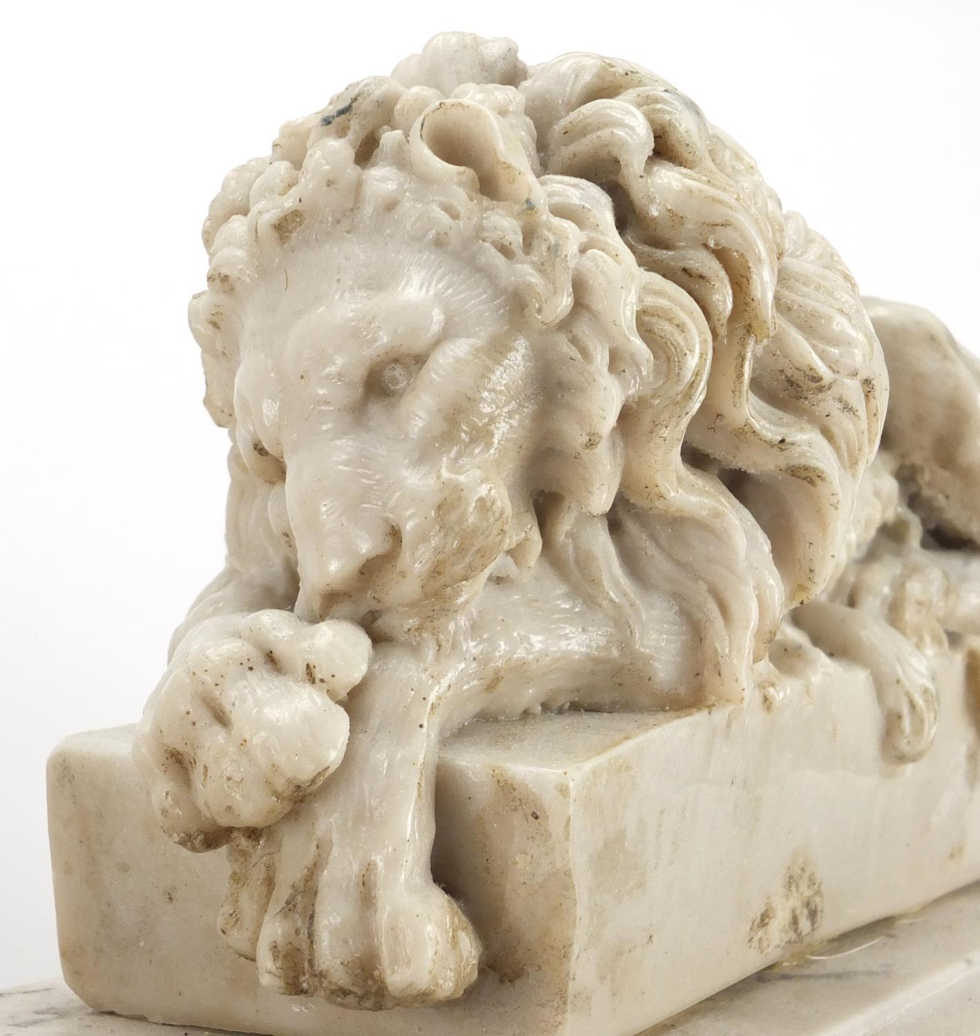 Pair of Italian Grand Tour marble carvings of lions, The Sleeping and The Vigilant, each 29cm high x - Image 3 of 9