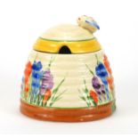 Clarice Cliff Bizarre pottery jam pot and cover, hand painted in the Crocus pattern, 10cm high : For