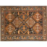 Rectangular North West Persian Yalameg rug, the central field having a flower and bird design onto a