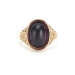 Victorian 9ct gold cabochon purple stone ring with scroll shoulders, Birmingham 1865, size Q,