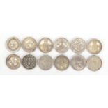 Twelve Chinese silver coloured metal coins including fatman design examples : For Further