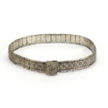 Indian 700 grade silver wedding belt, decorated with a repeat flower head design, each link