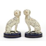 Pair of Staffordshire seated Dalmatians, each 13.5cm high : For Further Condition Reports Please