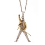 Silver gilt Freddie Mercury pendant on a white metal chain, the pendant 4cm in length, approximate
