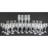 Bohemian Flamenco pattern crystal comprising set of twenty glasses and set of fourteen flutes, the
