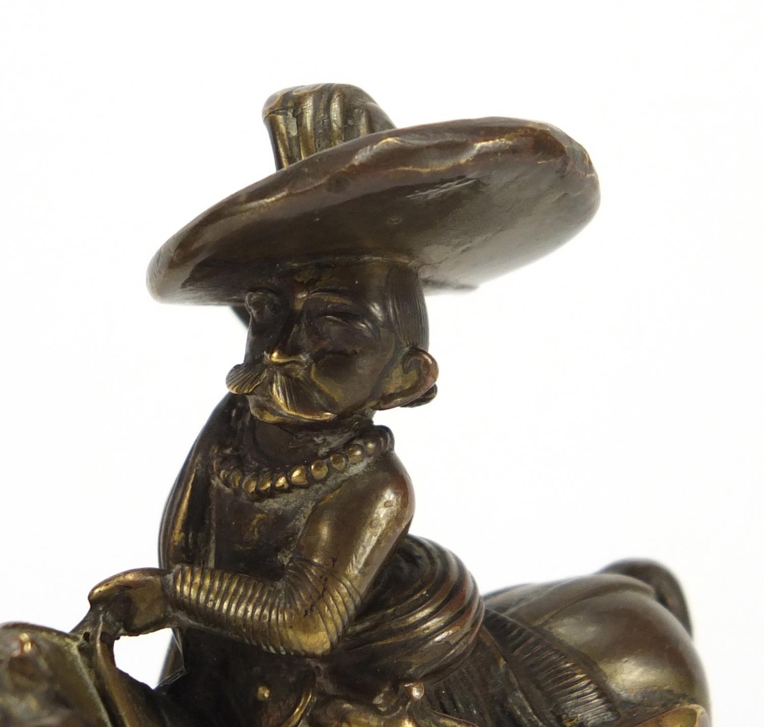 Pair of patinated bronze figures on horseback possibly South American, 8.5cm high : For Further - Image 2 of 5