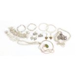 Silver and white metal jewellery including charm bracelet, earrings, pendants and necklaces,