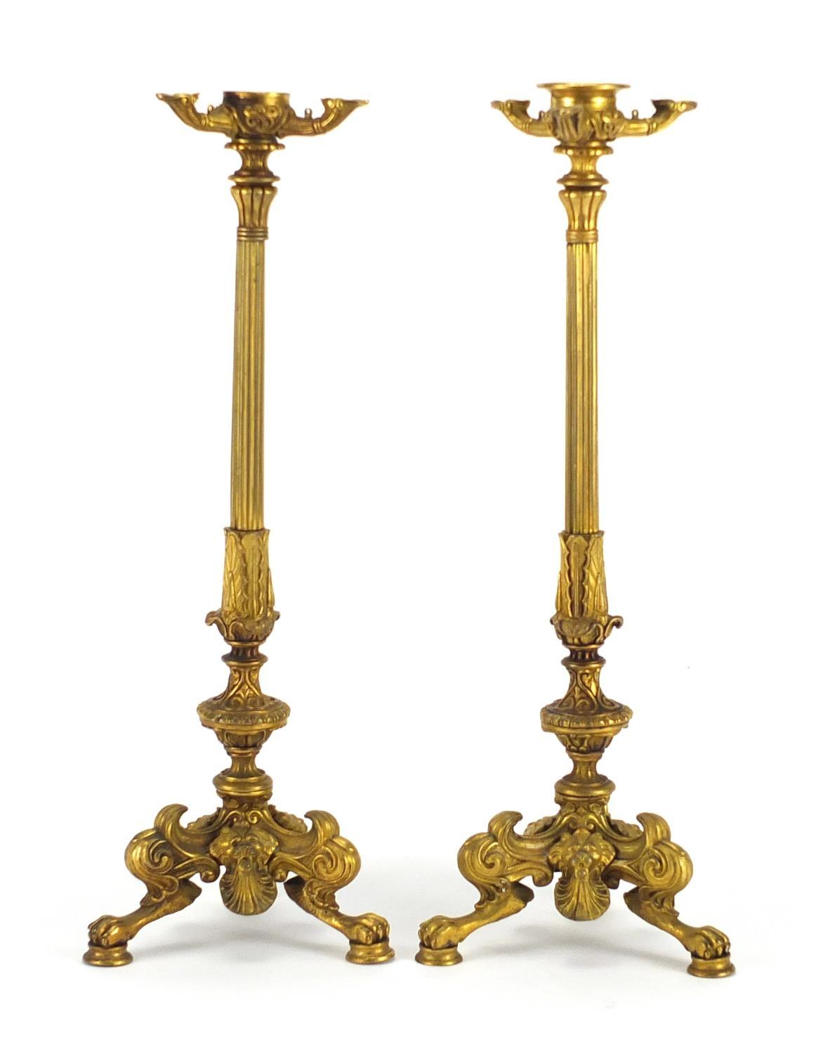 Pair of 19th century ormolu candlesticks with reeded columns, lion masks and claw feet, each 34. - Image 2 of 6