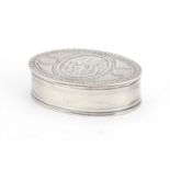 Continental silver oval snuff box, the hinged lid embossed with putti, indistinct mark to the lid,