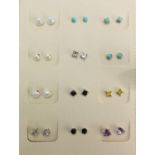 Forty two pairs of silver stud earrings set with semi precious stones : For Further Condition