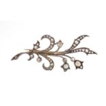 Unmarked white metal diamond and pearl floral spray brooch, 5.5cm in length, approximate weight 4.6g