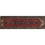 Rectangular Turkish Anatolian carpet runner, the central field having a repeat flower design onto