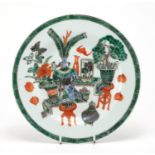 Chinese porcelain plate hand painted in the famille verte palette with objects, 23cm in diameter :