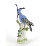19th century continental porcelain Jay bird perched on a branch, factory marks to the reverse, 29.