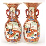 Pair of Japanese Arita porcelain vases with twin handles, each hand painted with figures and