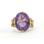 18ct gold amethyst solitaire ring, with bow design shoulders, size F, approximate weight 6.0g :