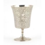 Islamic silver chalice profusely engraved with script, impressed marks to the base, 12cm high,