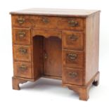 Antique walnut kneehole desk with quarter veneered top, cross banded and feather banded drawers