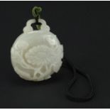 Chinese white jade belt hook, finely carved with flowers, 6cm high : For Further Condition Reports