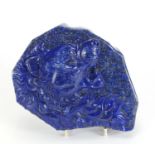 Large Chinese lapis lazuli panel carved with a lions head, housed in a fitted box, the panel 20cm
