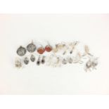 Eleven pairs of silver and white metal earrings, some set with semi precious stones, approximate