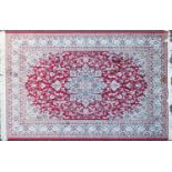 Rectangular Keshan design red ground floral rug, 200cm x 140cm : For Further Condition Reports and