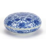 Chinese blue and white porcelain bun box and cover, hand painted with flower heads amongst foliate