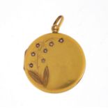 Antique continental unmarked gold pendant set with seed pearls, 2.6cm in diameter, approximate