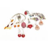 Silver semi precious stone jewellery comprising four pairs of earrings, four pendants, a bracelet