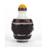 Chinese Peking cameo glass snuff bottle with stopper, decorated with mythical heads, 8cm high :