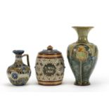 Royal Doulton stoneware including an Art Nouveau vase and a tobacco jar inscribed T Sell dated 1900,