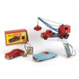 Vintage toys including a Schuco electric car with box, numbered 5380U, German tinplate clockwork car