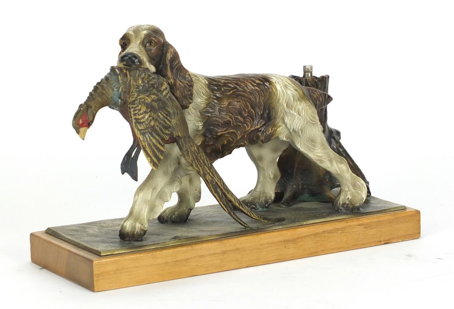 Austrian cold painted table lighter in the form of a spaniel with its prey, 25cm wide : For