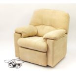 Beige upholstered electric reclining armchair, 105cm high : For Further Condition Reports and Live